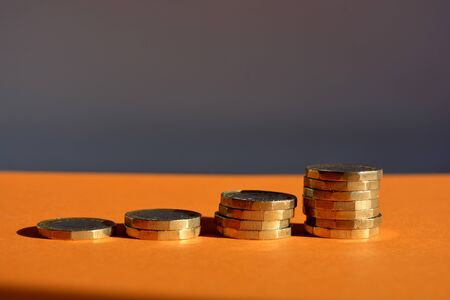 Piles of coins with copy space
