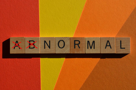 Abnormal, with Ab crossed out, leaving the opposite word, Normalの写真素材