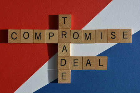 Compromise, Trade, Deal, words in crossword form on red, white and blue backgroundの写真素材