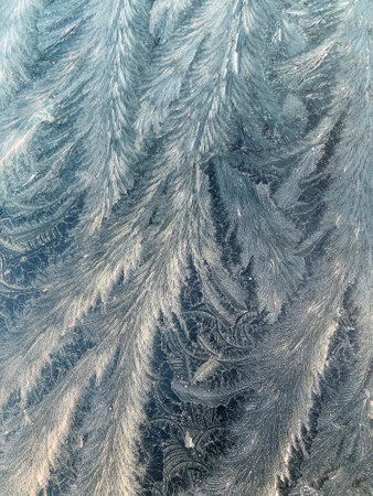 Abstract pattern, texture pattern of ice on windscreen glass after heavy frostの写真素材