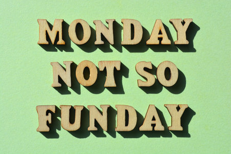 Monday Not So Funday. words in wooden alphabet letters isolated on backgroundの写真素材