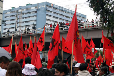 Quito, Ecuador - May 01, 2012 - Supporters of the Ecuadorian communist party in the parade on International Workers Day, also known as Labour Dayのeditorial素材