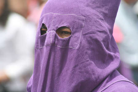 Quito, Ecuador - March 29, 2013: Penitent at the Good Friday procession のeditorial素材