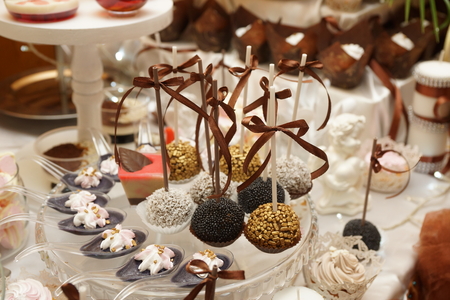 delicious fruit and other goodies on the tableの写真素材