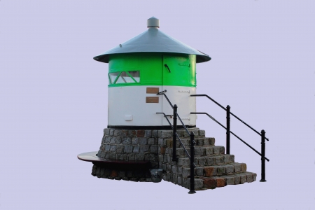 green-white lighthouse on pierの写真素材