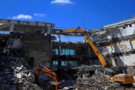 the excavator breaks a buildingのeditorial素材