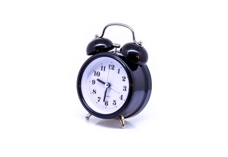 Black alarm clock isolated on white background.の写真素材