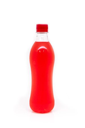 Plastic drinking water bottles, drink red isolated.の写真素材