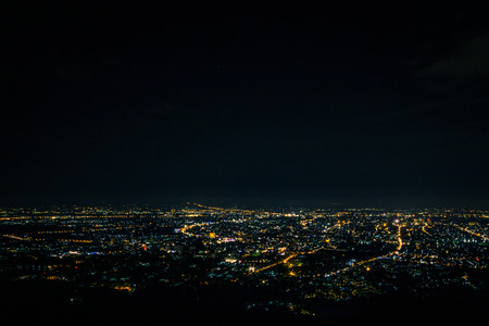 Night city scape at top view point of Chiang Mai, Thailand.の写真素材