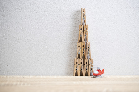 wood tower cloth clamp with helicopter model figureの写真素材