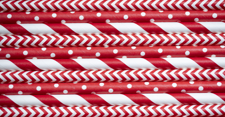 Close up paper striped colorful straws background