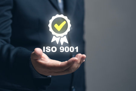The concept of iso9001. Businessman scores business assessment ISO 9001, a quality management system (QMS) standard for various business areas.の写真素材