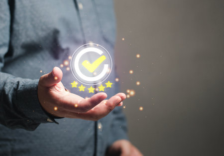 concept of satisfaction The man gave a five-star satisfaction rating on his hand. Scoring surveys on the services of shops, industries, education, restaurants, hotels.の写真素材