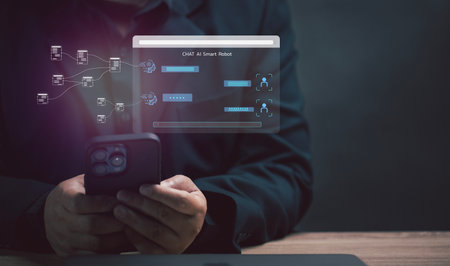 man uses chat AI to find answers by his mobile phone. AI concept.  using technology and transforming the system over the internet. artificial intelligence. Chat bot conversation assistant.の写真素材