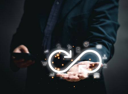 Technology infinity data link concept. man Hands holding virtual infinity screen with technology marketing online. The network connection system innovation for business marketing.の写真素材