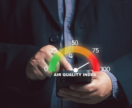 Businessman pointing at virtual screen measuring. concept of pm2.5 indicator weather air on mobile...