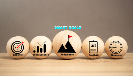 concept of smart goal, Business and SMART symbol on the Wooden ball  with words 'SMART, specific measurable achievable realistic timely. The strategy development creativity for success company.の写真素材