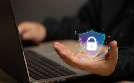 The user holds the symbol like a shield with a padlock inside. The security online protection safety for network corporate companies. Systems cyber security. Global online secure safe from hackers.の写真素材