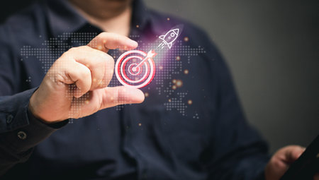 Businessman hold out goals and rocket, guidelines for global marketing strategy at virtual screen. Business achievement growth performance development and investment. opportunity. Financial target.の写真素材