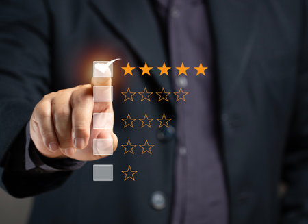 Man rates satisfaction using rating star on virtual screen. Concept of service satisfaction, survey, five star rating, highest satisfaction. Success business, quality service, survey feedback.の写真素材