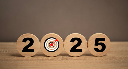 2025 marketing goal concepts icon on wooden ball placed on table. Business marketing tools and strategy technology for company success. Use tools for research and development for growth in future.の写真素材