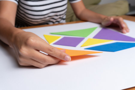 Tangram, Crafts, games and puzzles with colored cards for young childrenの写真素材