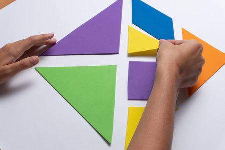 Puzzle game for children made with colored cardboard. education and teachingの写真素材