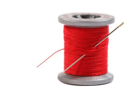 Isolated spool of threadの写真素材