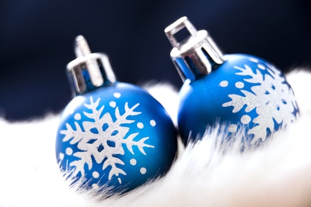Blue baubles with white flakesの写真素材