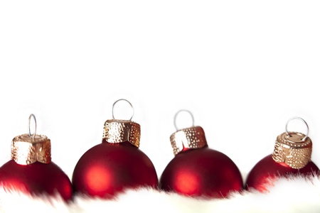 Red baubles on a white backgroundの写真素材