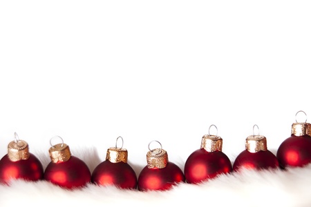 Red baubles on a white backgroundの写真素材