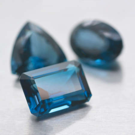 Lot of three blue topaz stones carved with different shapes. Precious stonesの写真素材