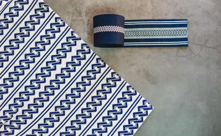 Traditional Japanese kimono with beautiful blue print and its traditional embroidered belt on a...