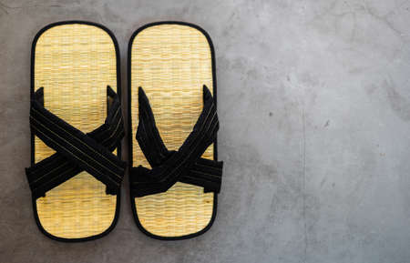 Pair of traditional zori shoes from japan. Front view of bamboo sandals.