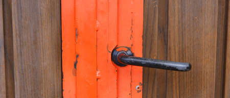 Orange and brown closed metal doorの写真素材