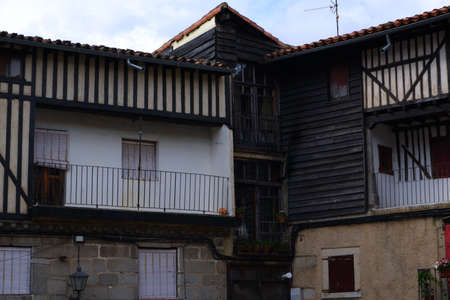 Old street with buildings in a village in Spainの写真素材