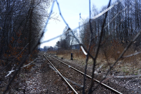 Metal rusty train track in an industrial areaの写真素材