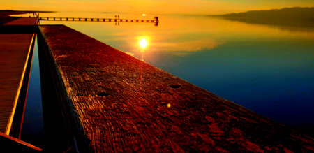 sunset on the pier in the morning, beautiful photoの写真素材