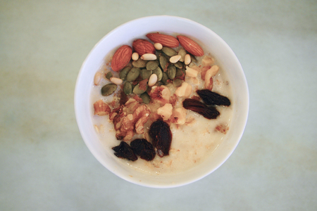 healthy breakfast rolled outs, mixed nuts and raisinsの写真素材