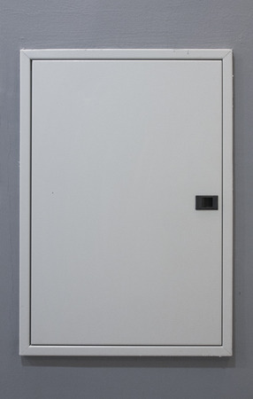 domestic fusebox on grey wallの写真素材