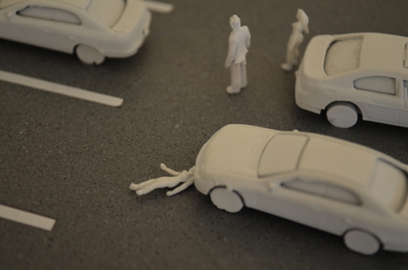 Car accident woman gets hit by a car at a parking lot. Road Safety.の写真素材