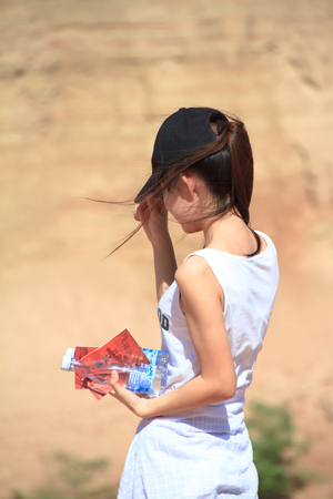 long hair girl under hot sunのeditorial素材
