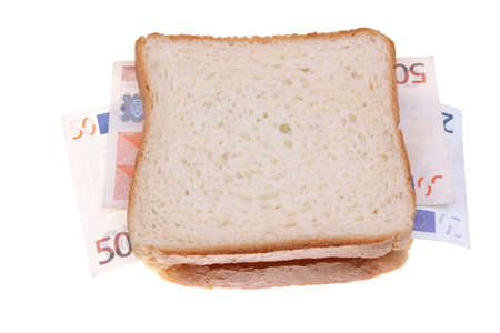Close up of sandwich made with money の写真素材