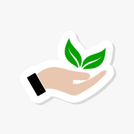 Organic sticker logo. Leafs in hand sign. Natural products logoのイラスト素材