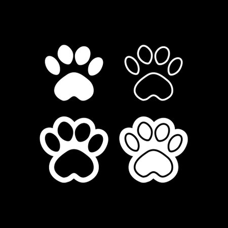 Paw print icon isolated on dark backgroundのイラスト素材