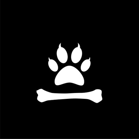 Paw and bone icon isolated on dark backgroundのイラスト素材