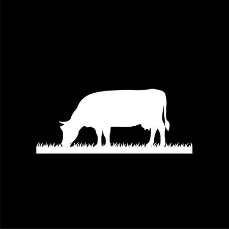Cow is eating grass icon isolated on dark backgroundのイラスト素材