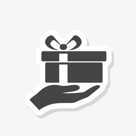 Hand hold gift box icon sticker isolated on white backgroundのイラスト素材