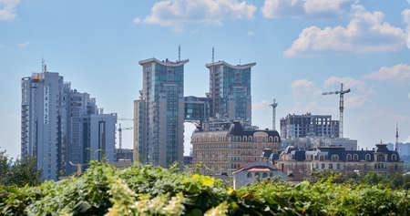 New building in a great location near the city park.a structure with a roof and walls, such as a...