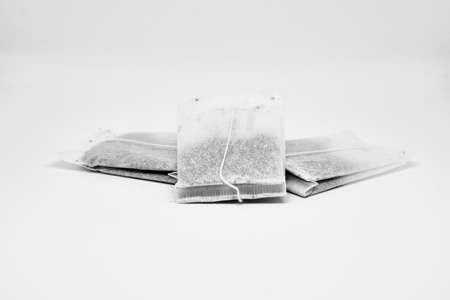 Three tea bags isolated on white background